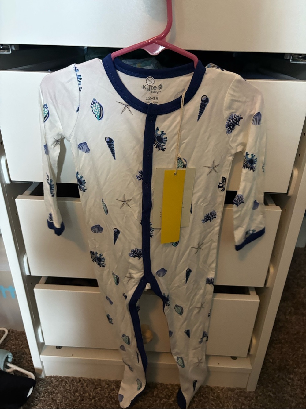 Kyte BABY White Footie with Blue Seashell Print